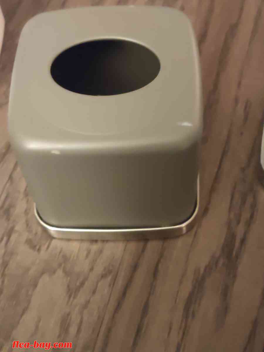 grey and chrome metal tissue box cover