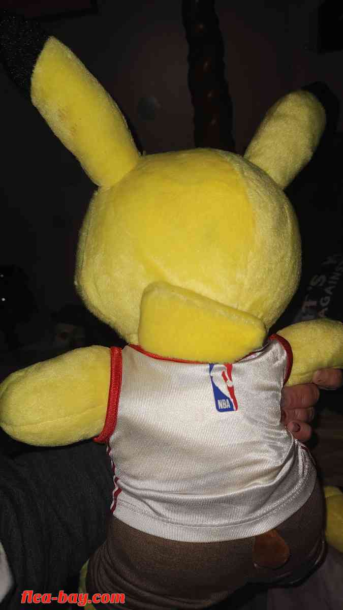 two large Pikachu stuffed dolls with talking voice box in th