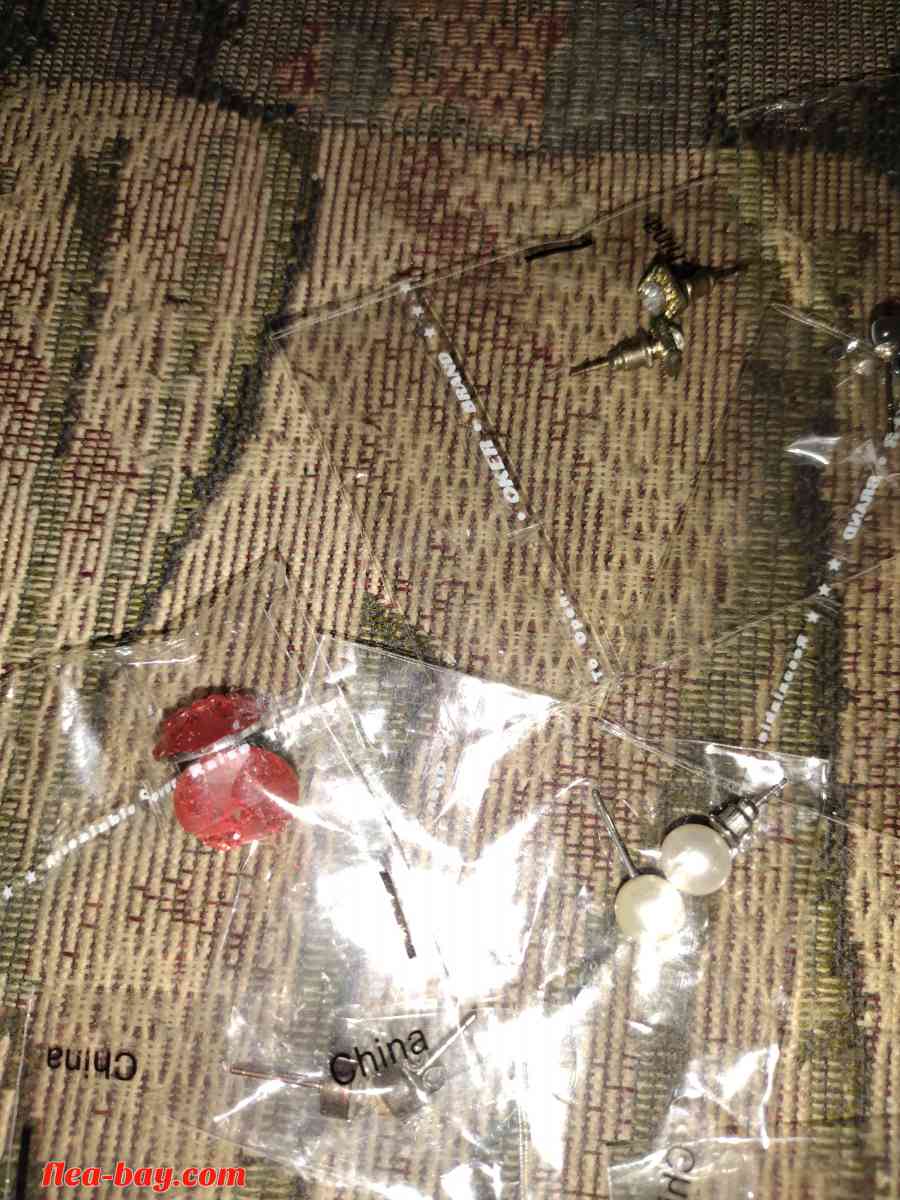 A bundle of post earrings