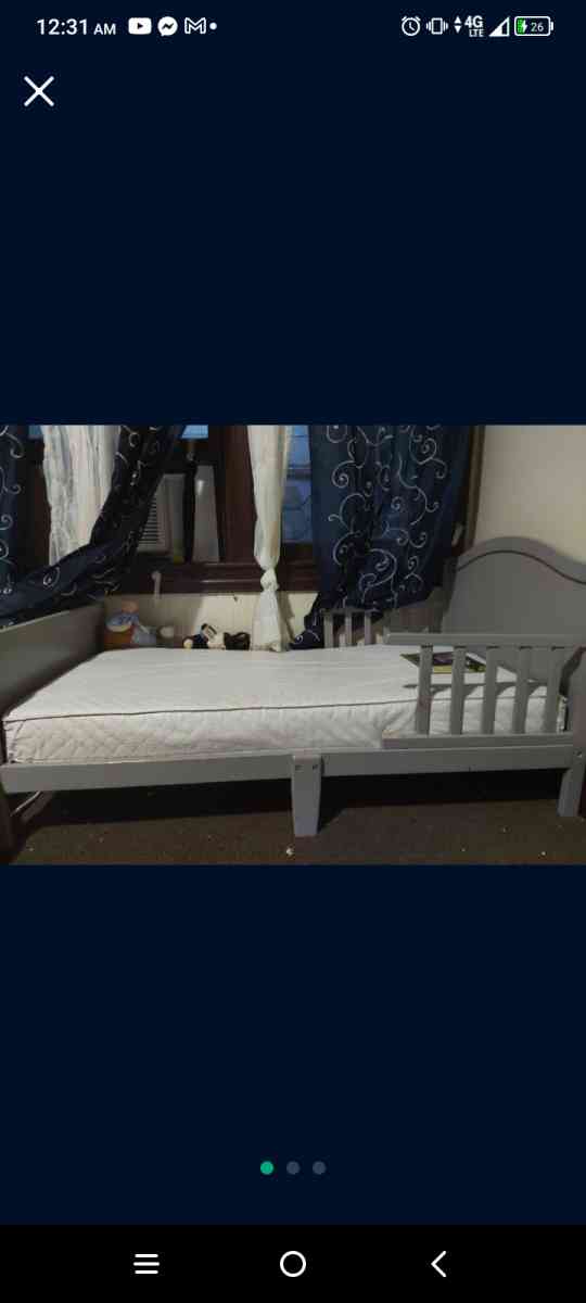 toddler bed frame with mattress.