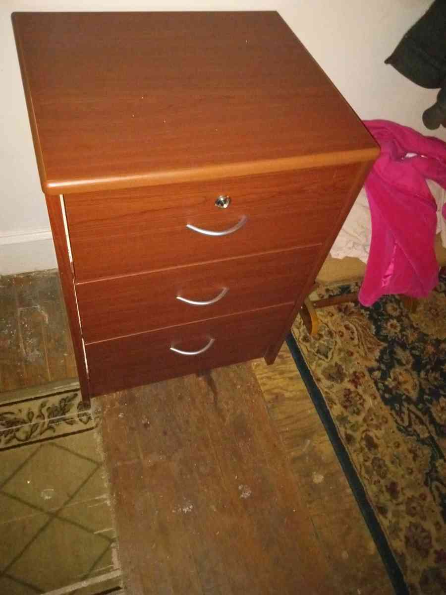 three drawer locking night stand