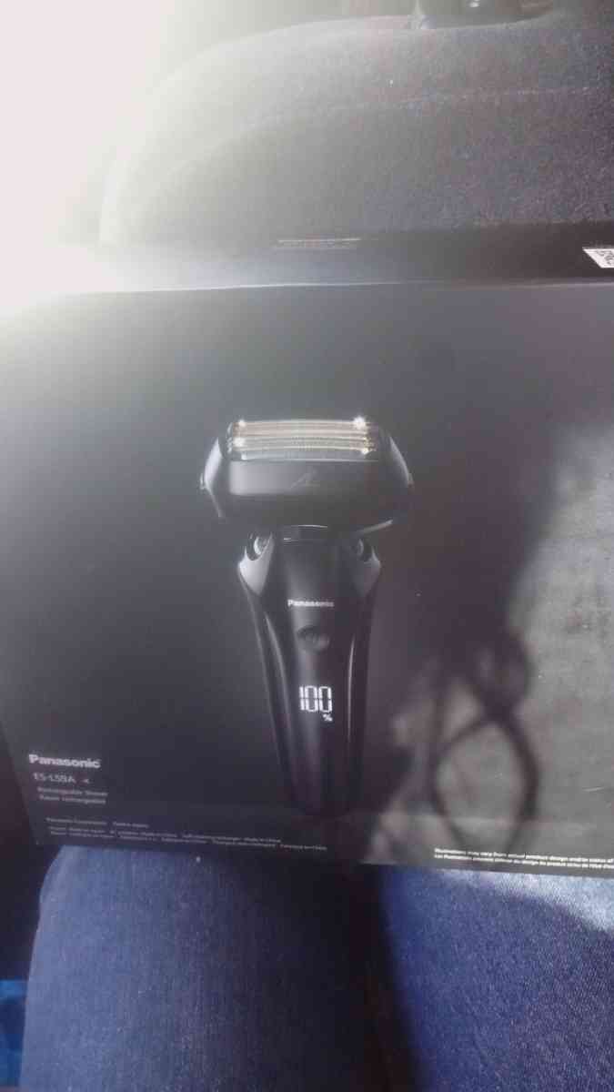 Panasonic Arc6 Shaver with self cleaning charging dock