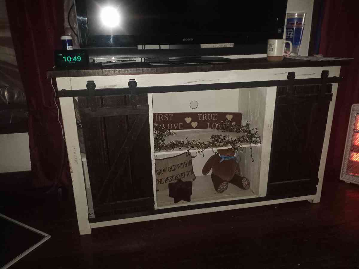 white washed barn door entertainment stand