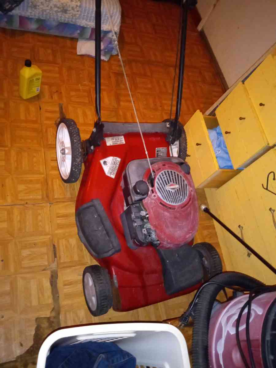 Two lawn mowers and AC cooler