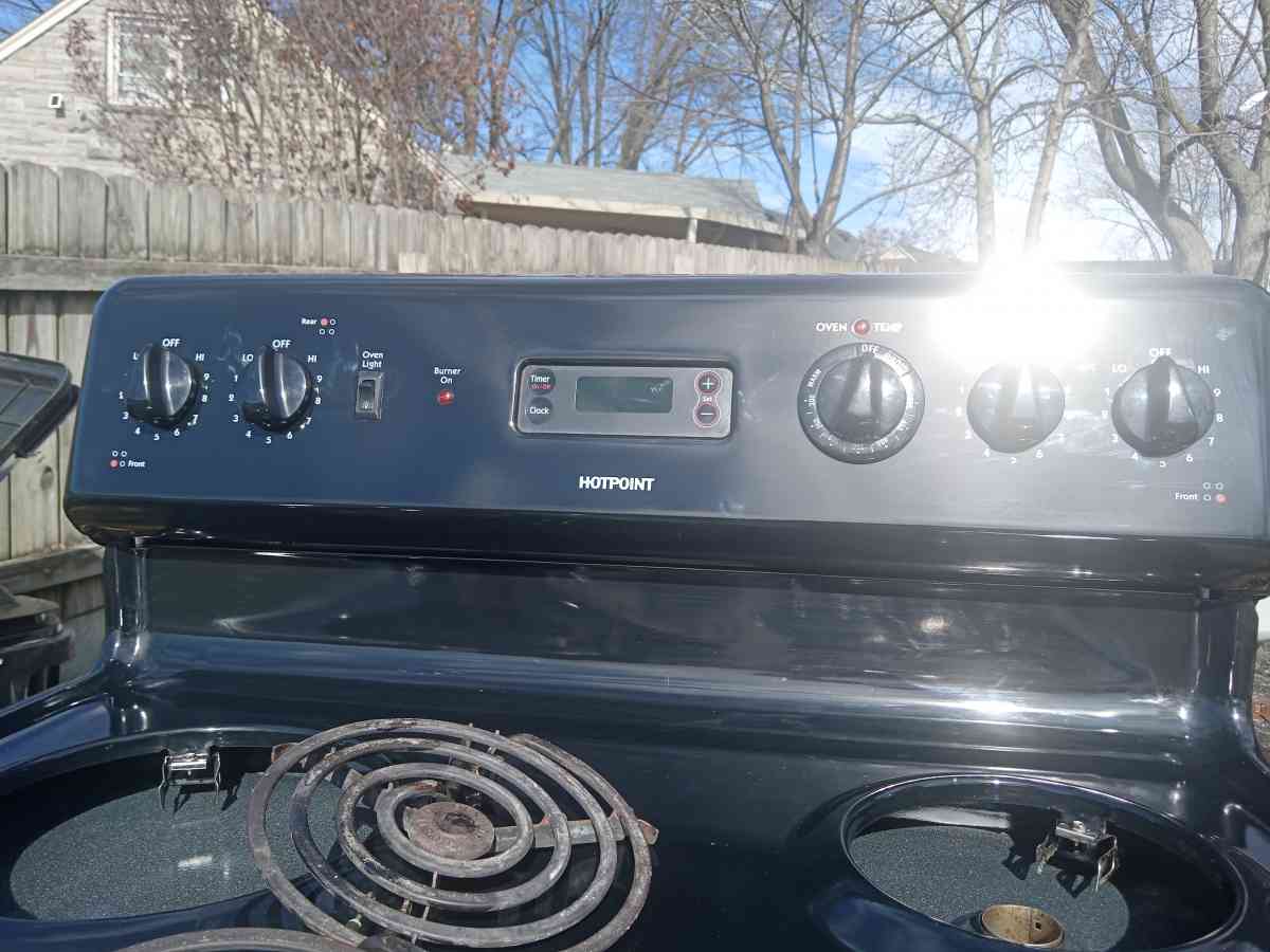 2 stoves and a refrigerator hot point is maker