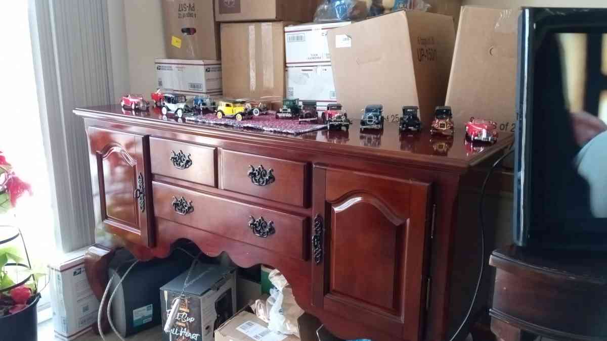 sofa and ottoman also buffet cabinet good condition as well