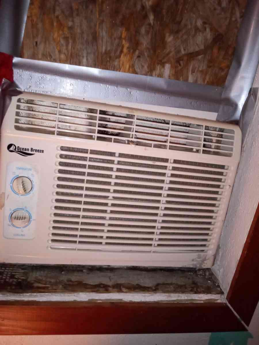 Two lawn mowers and AC cooler