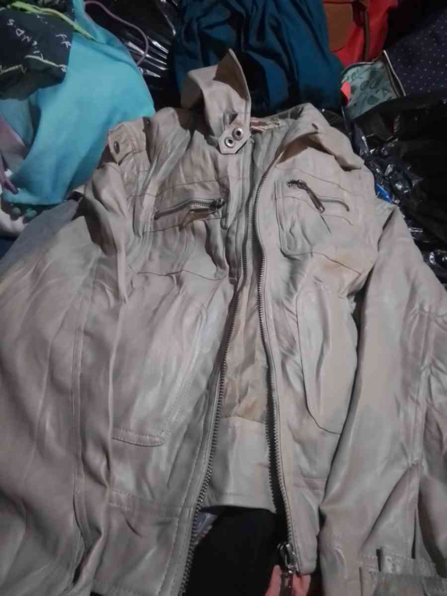 woman tan leather jacket