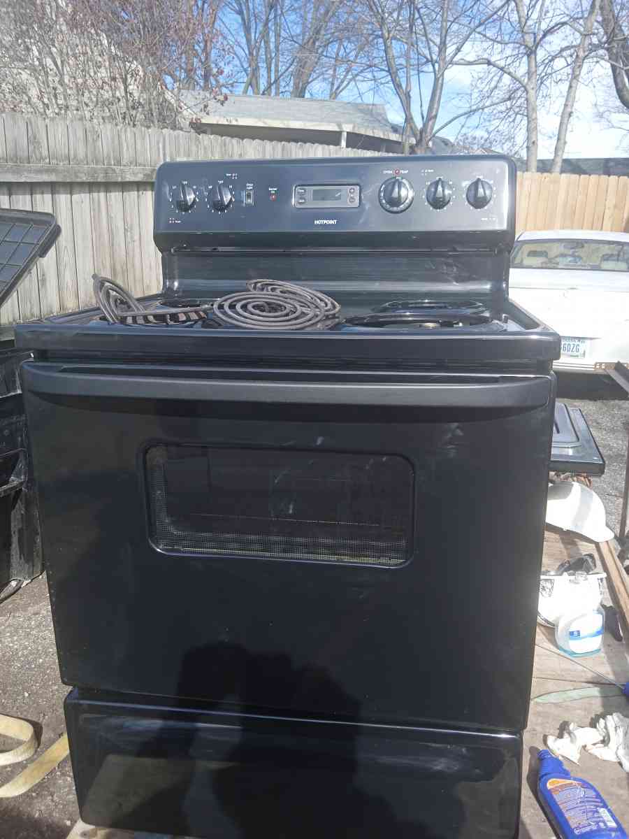 2 stoves and a refrigerator hot point is maker