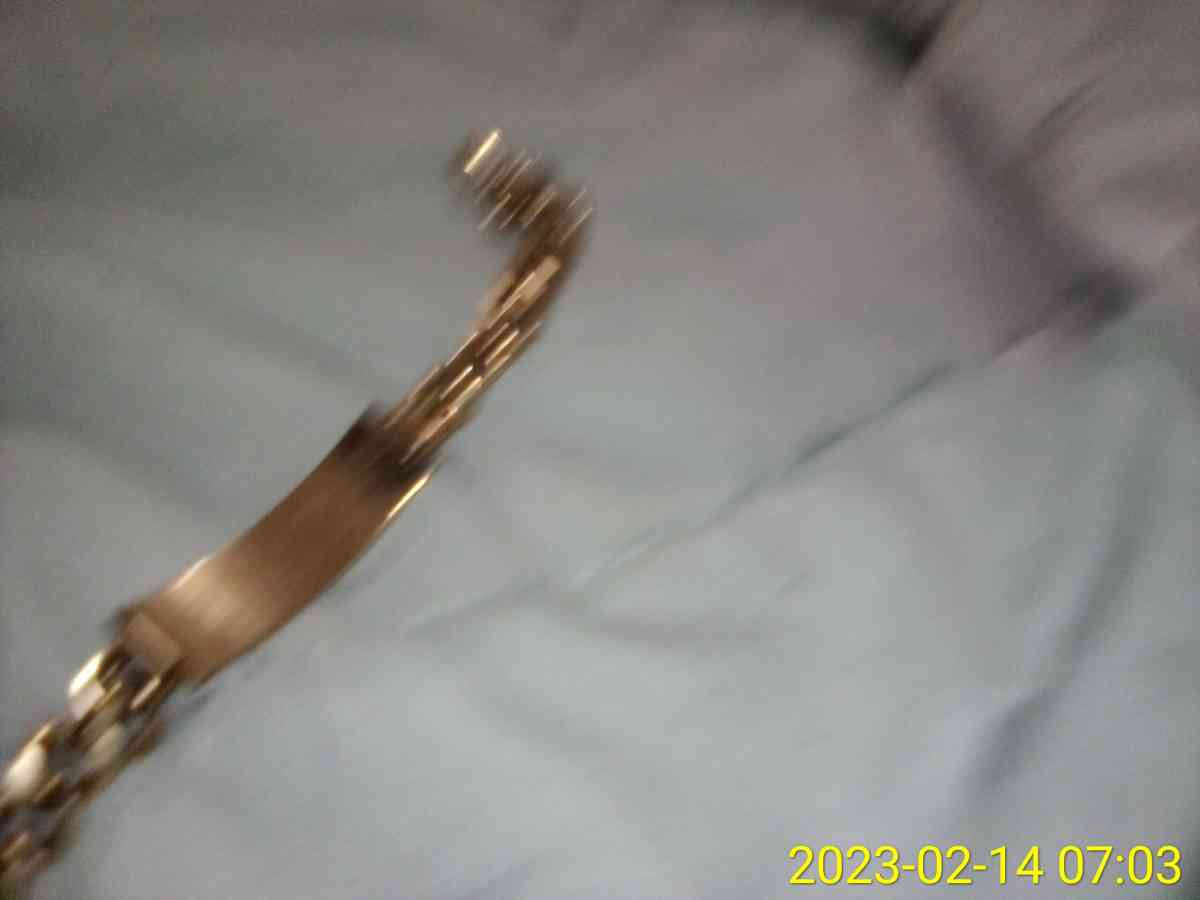 14k yellow gold cuban link Id bracelet