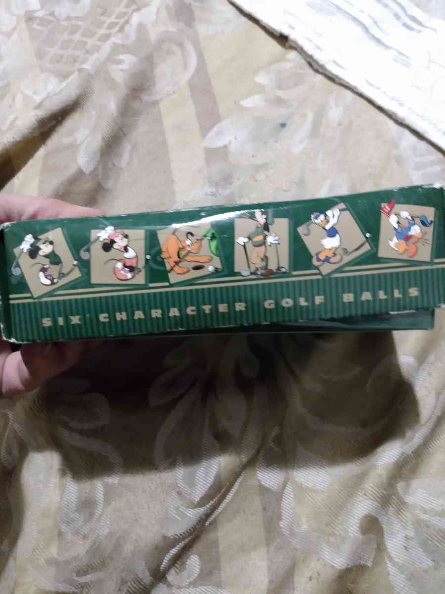 golf balls with mickey and goofy and Donald disney collectio