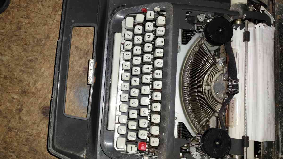 Signature 1965 Portable Typewriter with Case