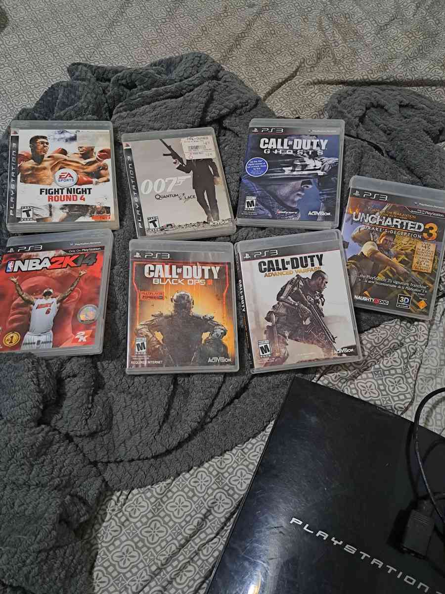 Im selling this ps3 with 7 games  without controllers
