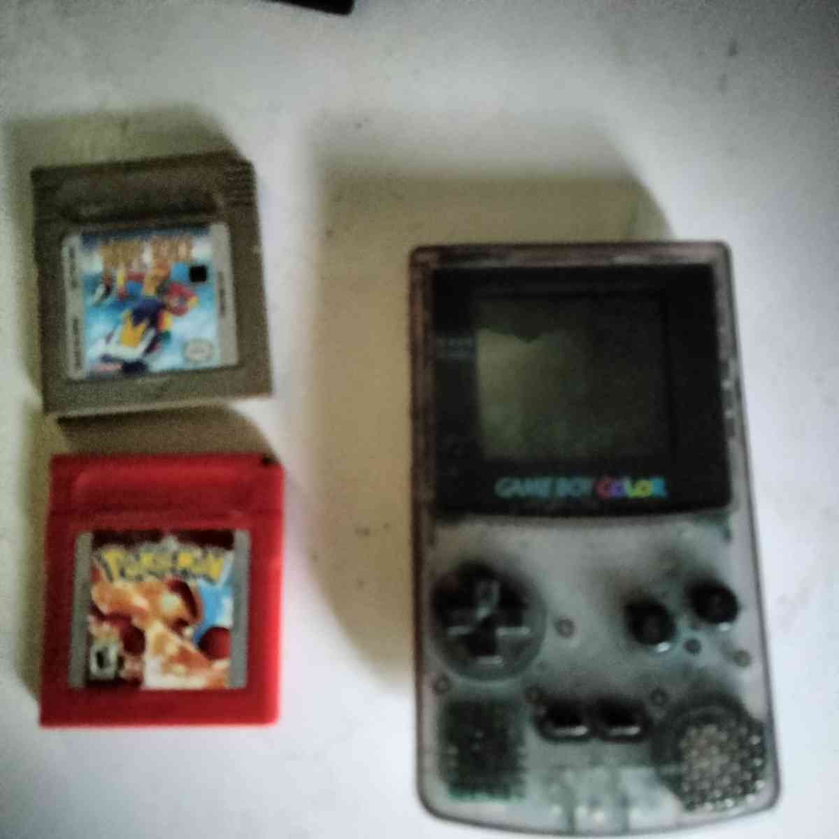 game boy color with 2 games