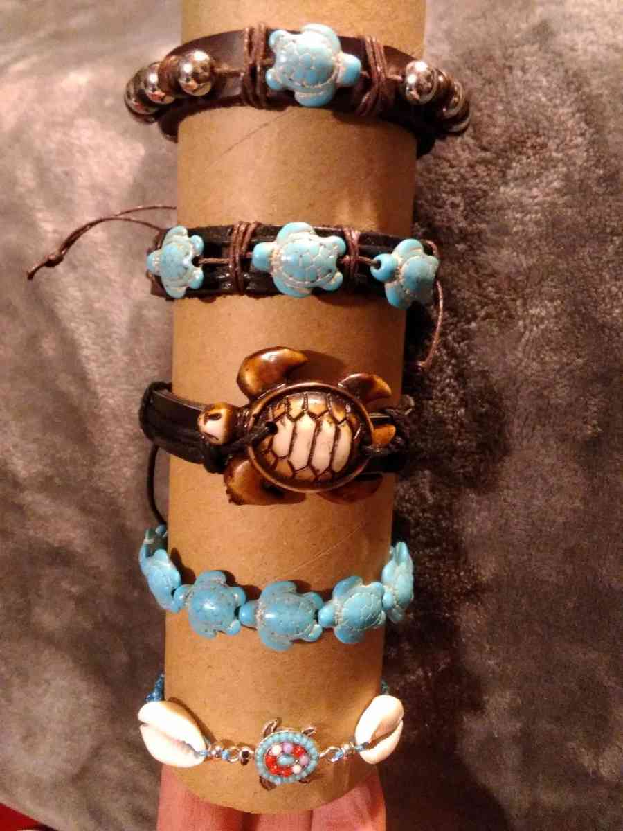 bracelets of symbolism with owls turtles and elephants
