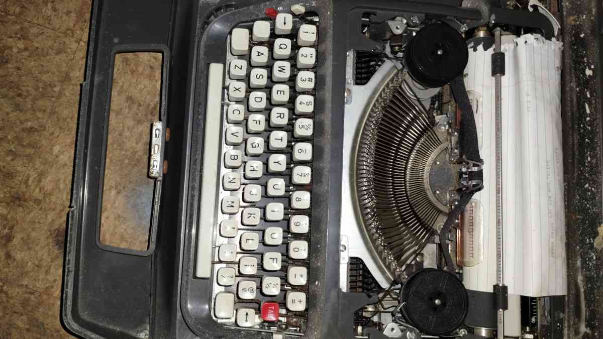 Signature 1965 Portable Typewriter with Case