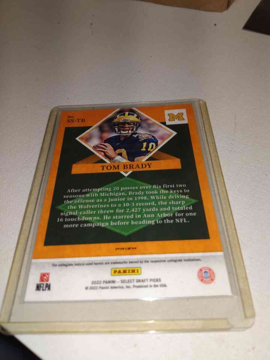 2022 select Tom Brady and his college uniform