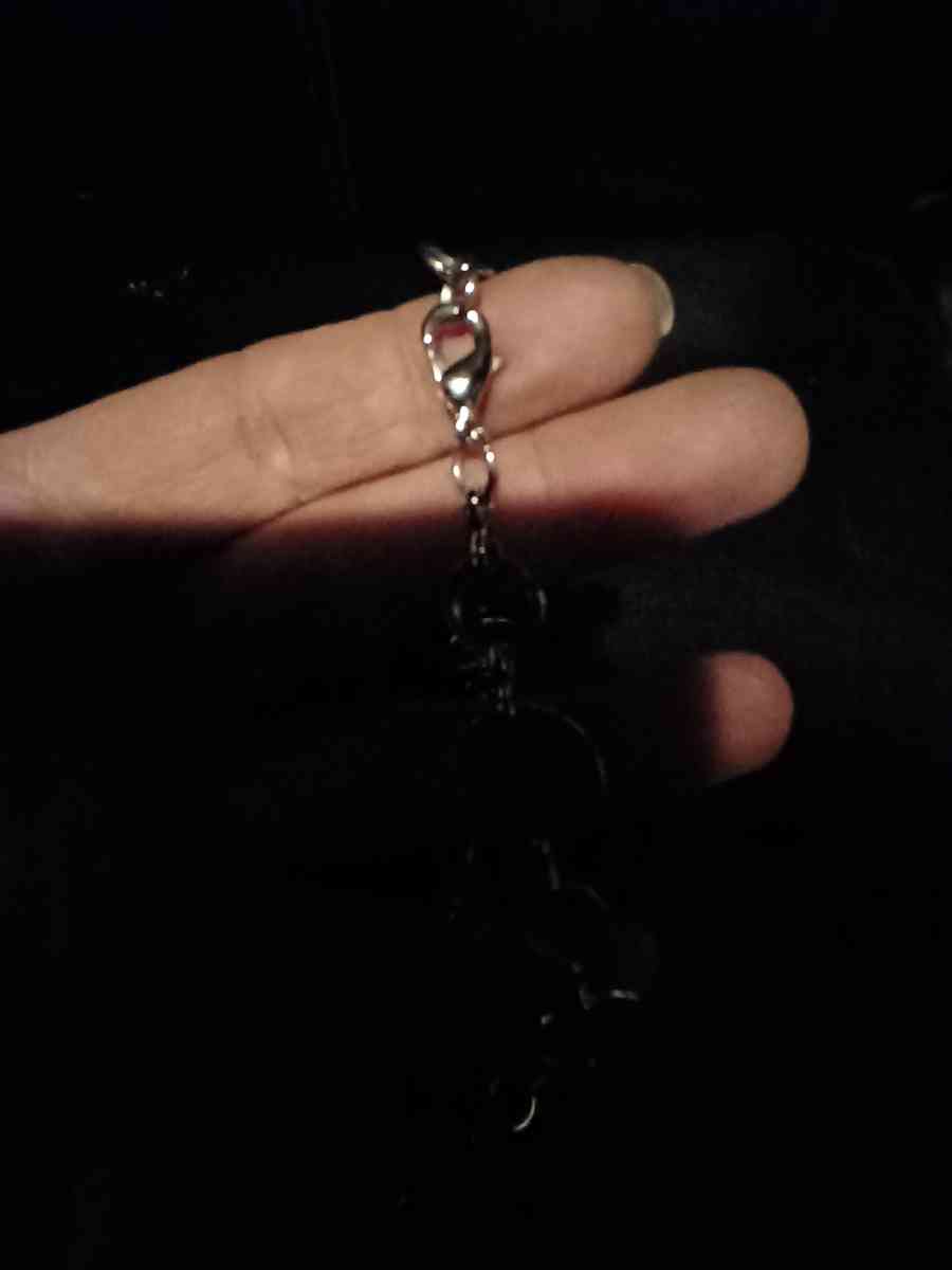 silver with a pendant and pear