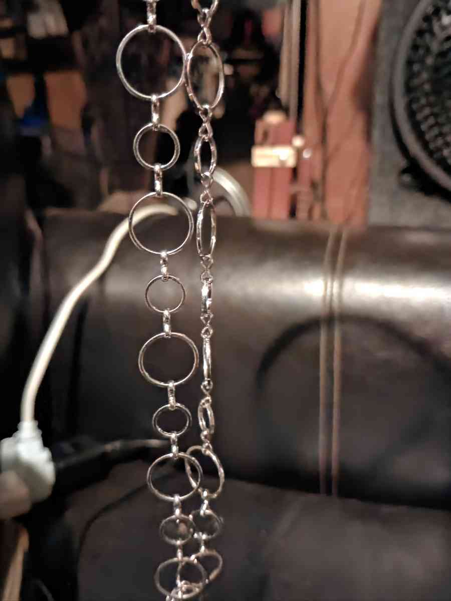 silver with a pendant and pear