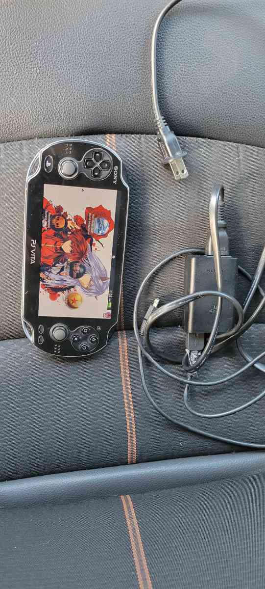 ps vita modded 256 gig memory card and charger with it