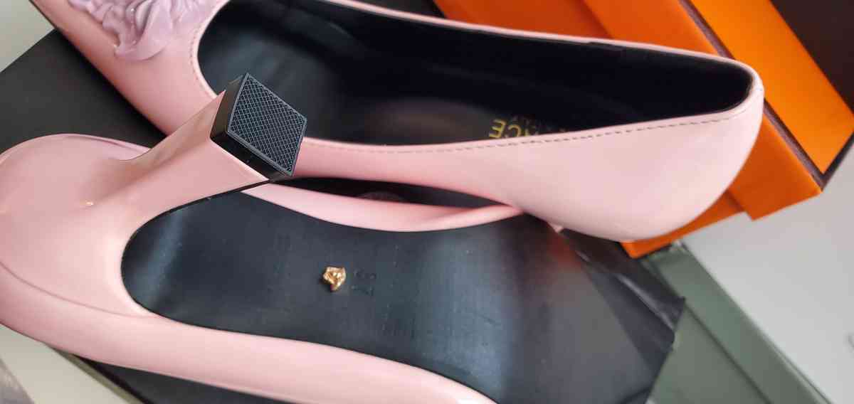 pointed Versace shoes