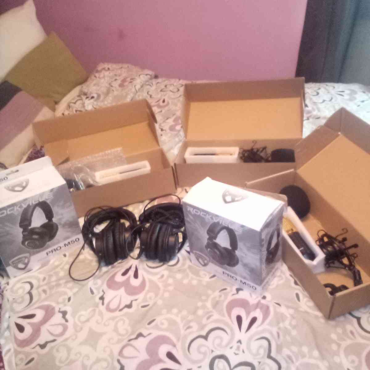 podcast mics and headphones and headphone amplifier