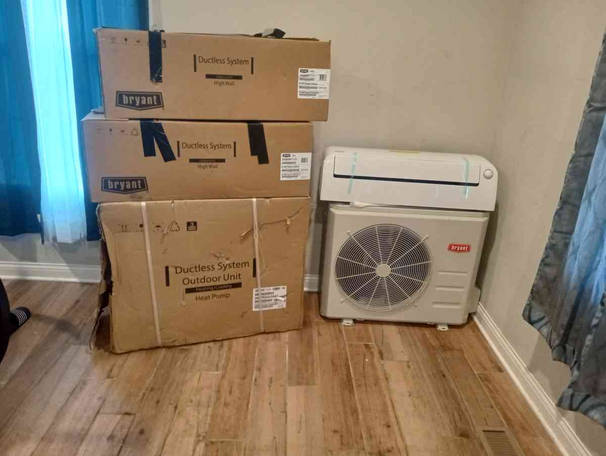 2 mini split outdoor heat pump system and 1 indoor head