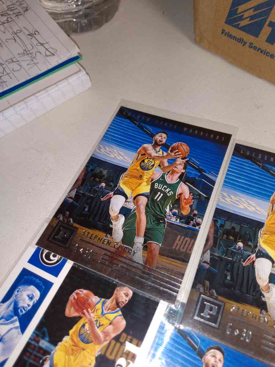 four card lot of Stephen Curry