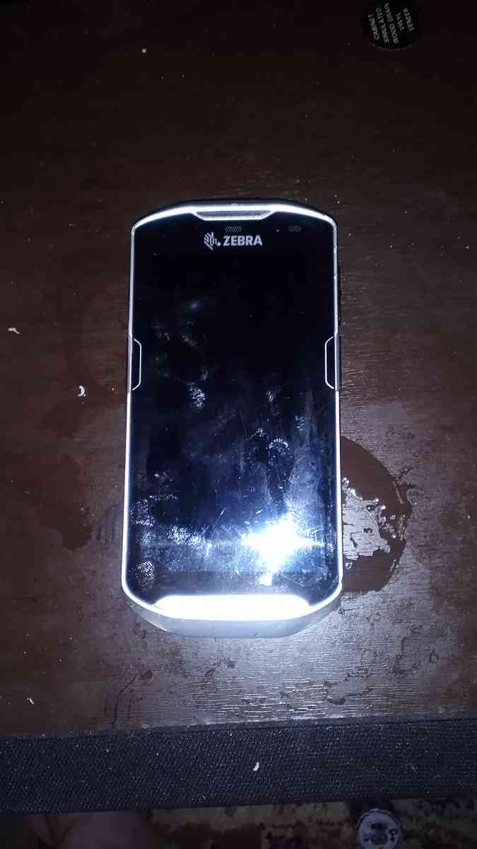 a used zebra tc560 barcode scanner