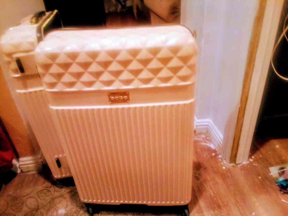 a suitcase threepiece bebe nice condition
