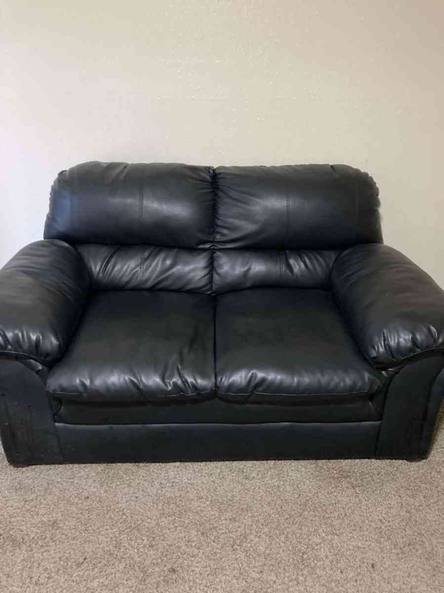 black leather couch w ottaman