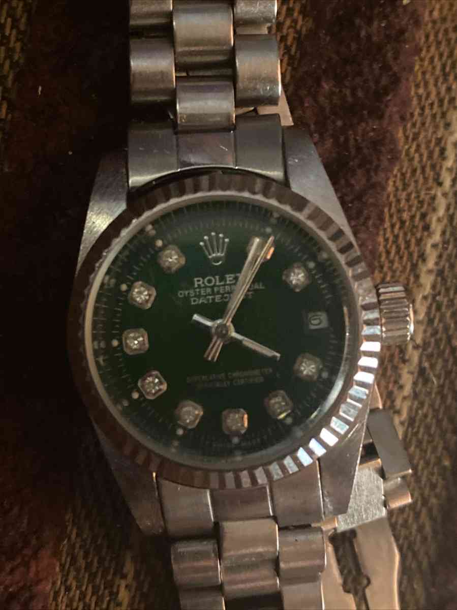 oyster perpetual datejust 18 karat white gold Rolex