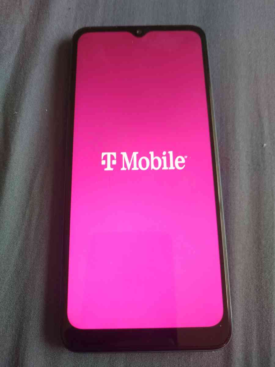 TMobile revvl 6 5G cellphone with charger cord and protector