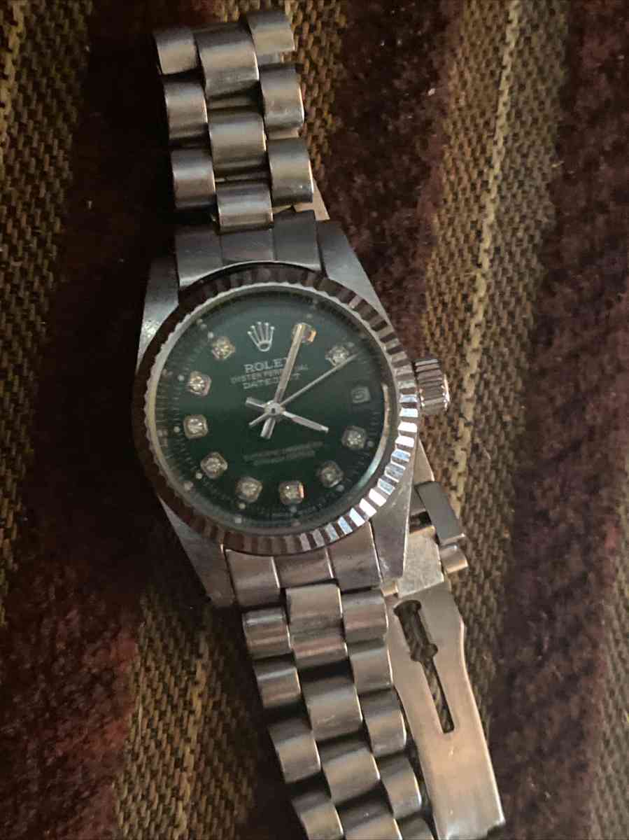 oyster perpetual datejust 18 karat white gold Rolex