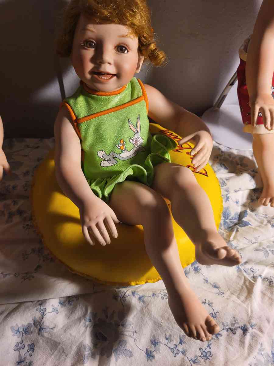 antique sitting girl doll