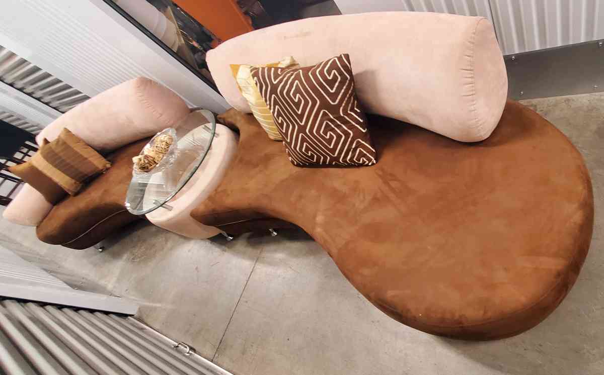 2 long curved sofas with matching table