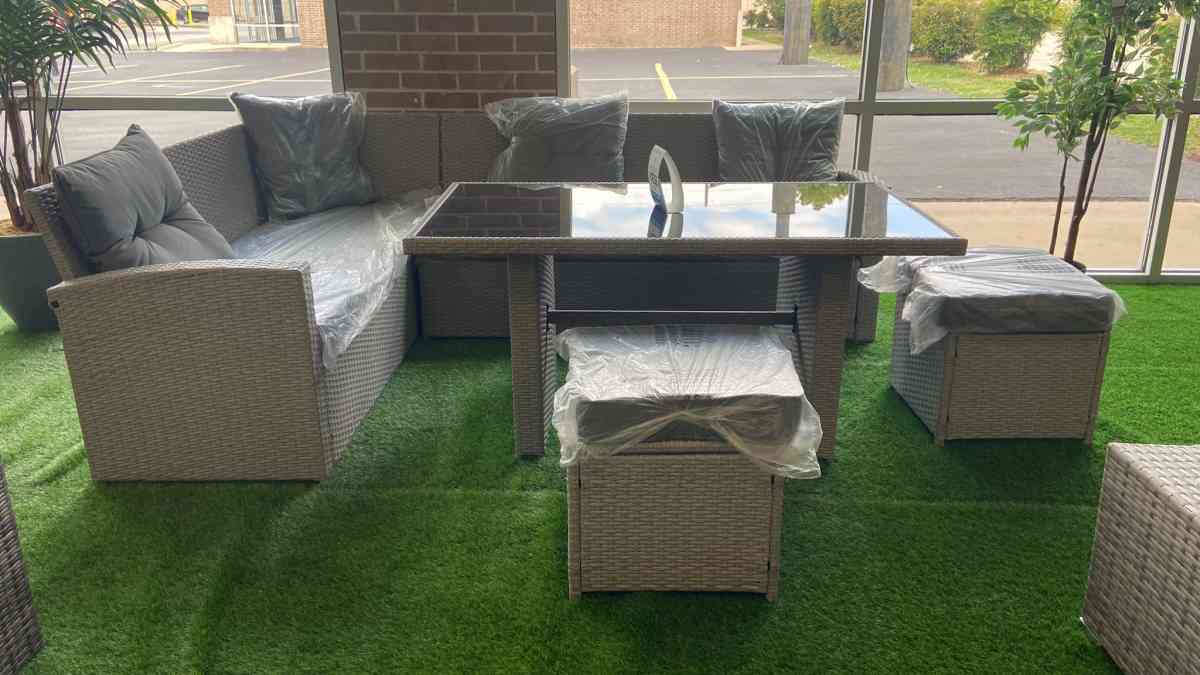 Patio sectional with gray cushions  we have delivery today 4