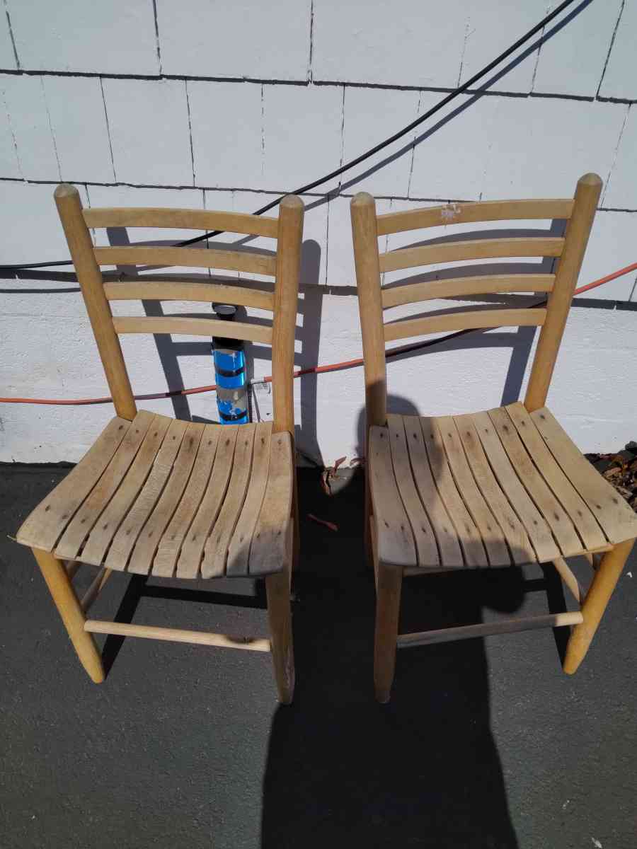 two wooden Pellegrin chairs and pieced for one