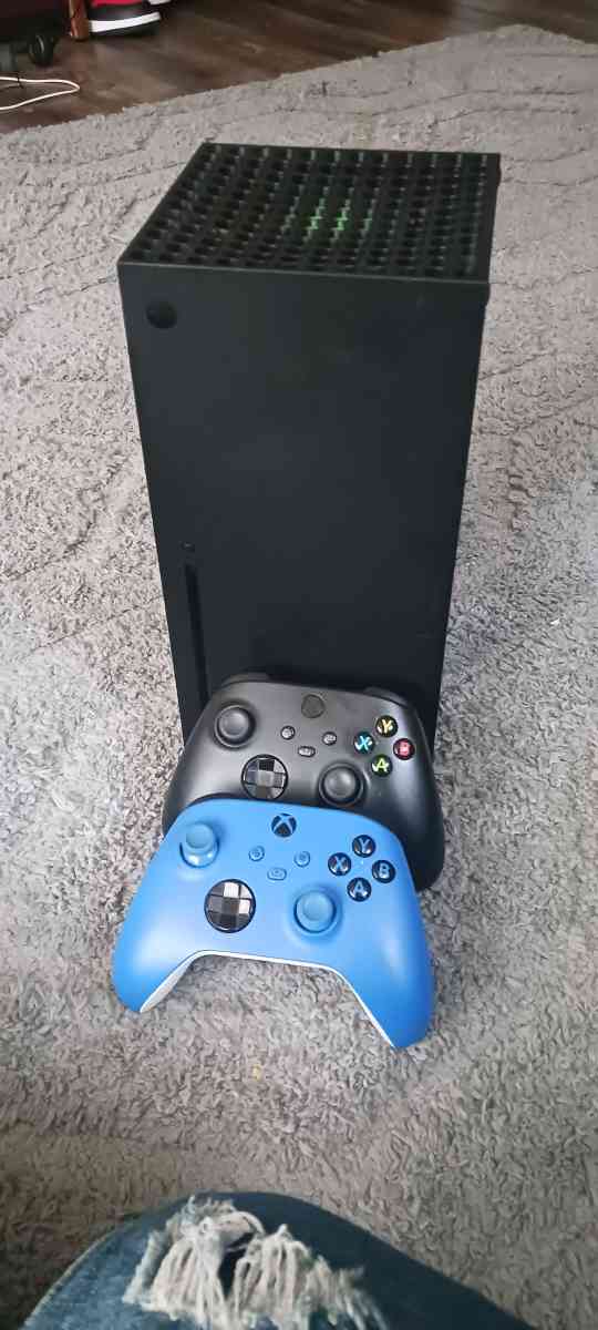 Xbox series x with controllers
