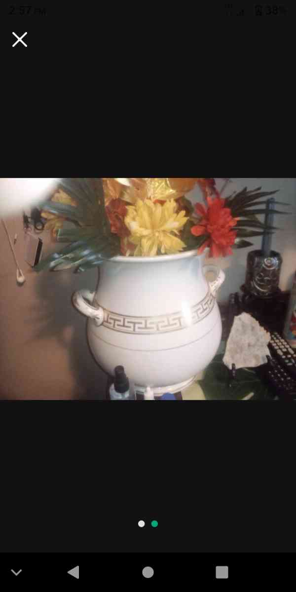 white and gold antique vase