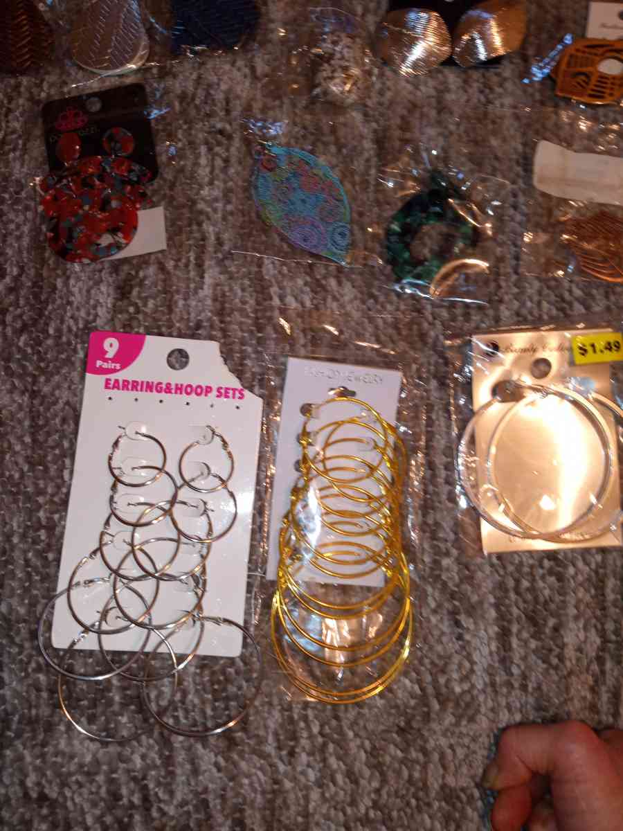 62 pairs of various brands of earrings they are all NIP