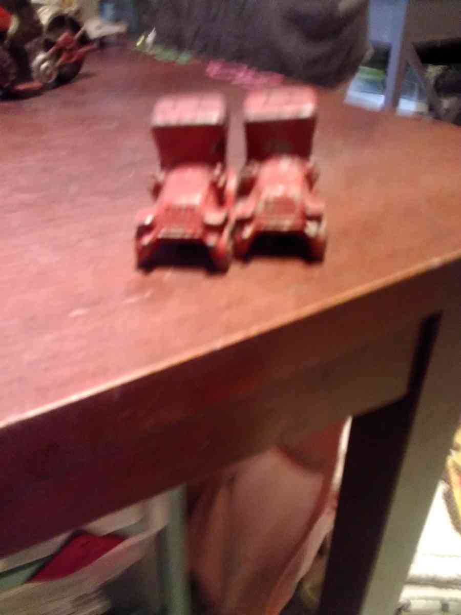 vintage red metal car salt and pepper shakers