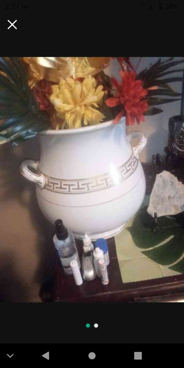 white and gold antique vase