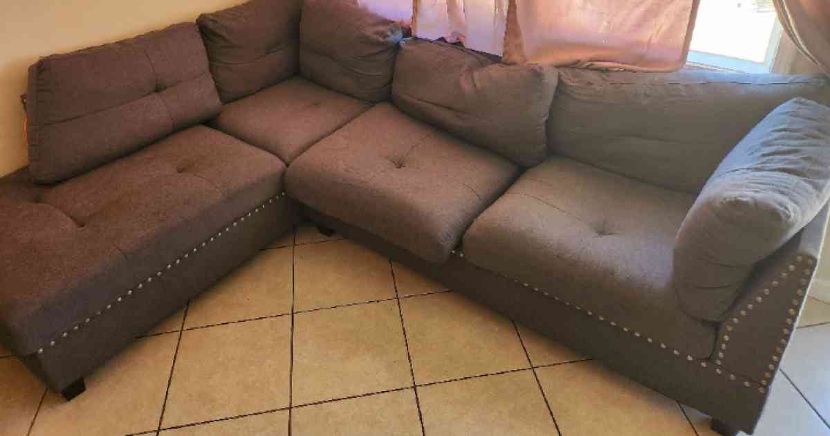 Grey sectional sofa with ottoman