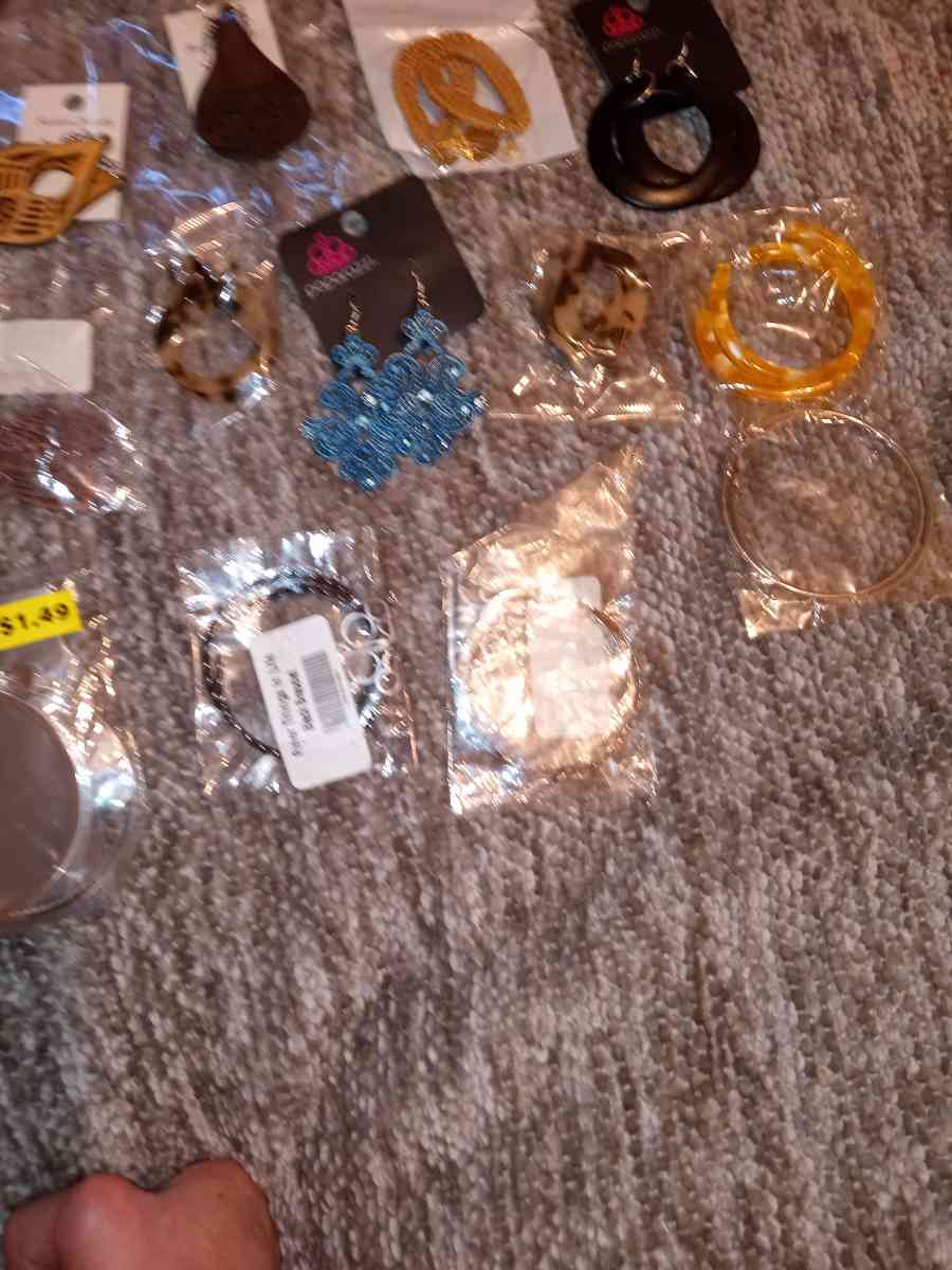 62 pairs of various brands of earrings they are all NIP