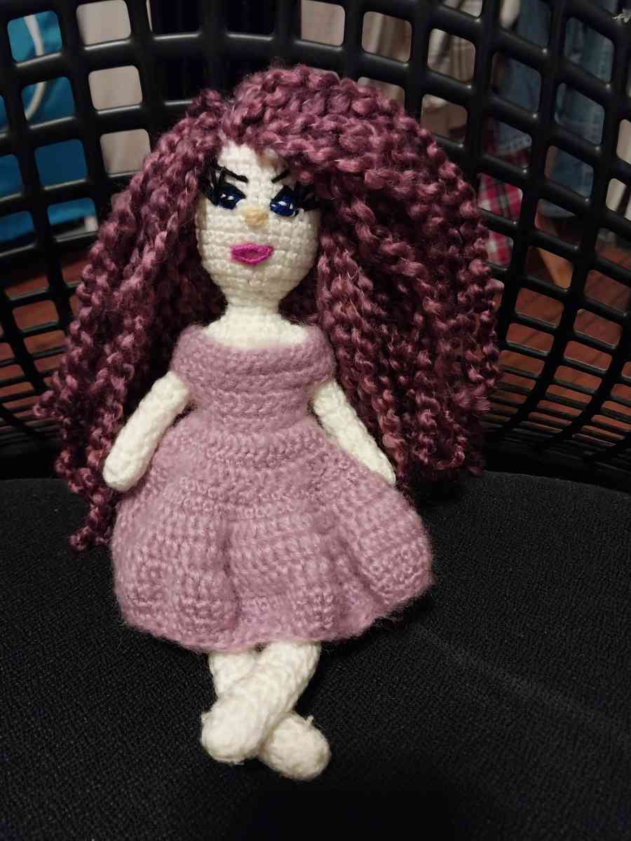 Handmade knitted doll