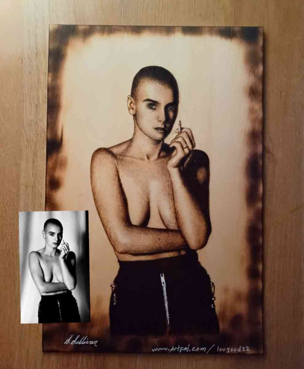 Portraits burned on wood