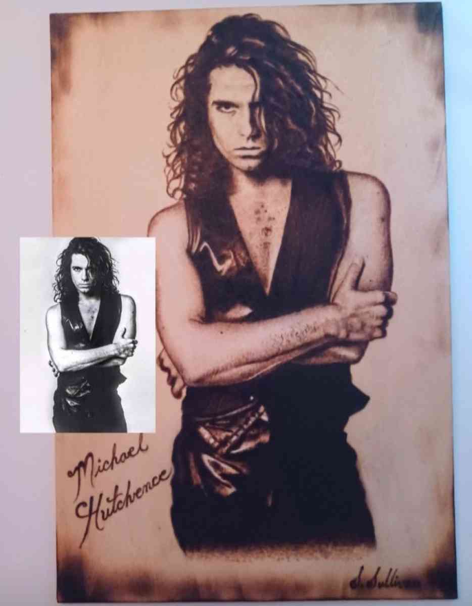 Portraits burned on wood