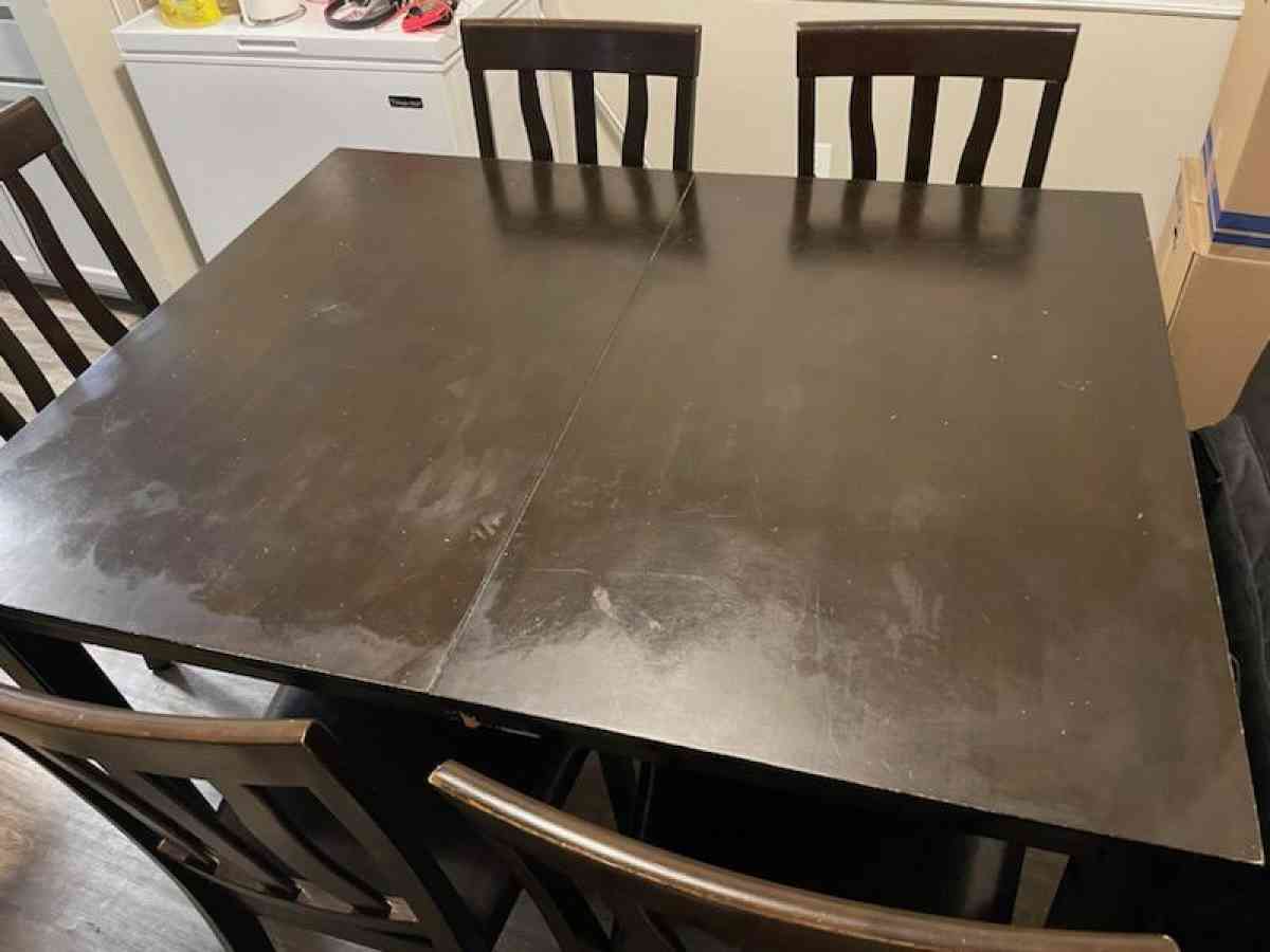 Table includes 5 chairs