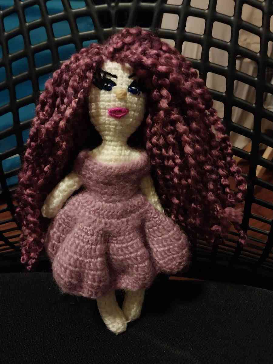 Handmade knitted doll